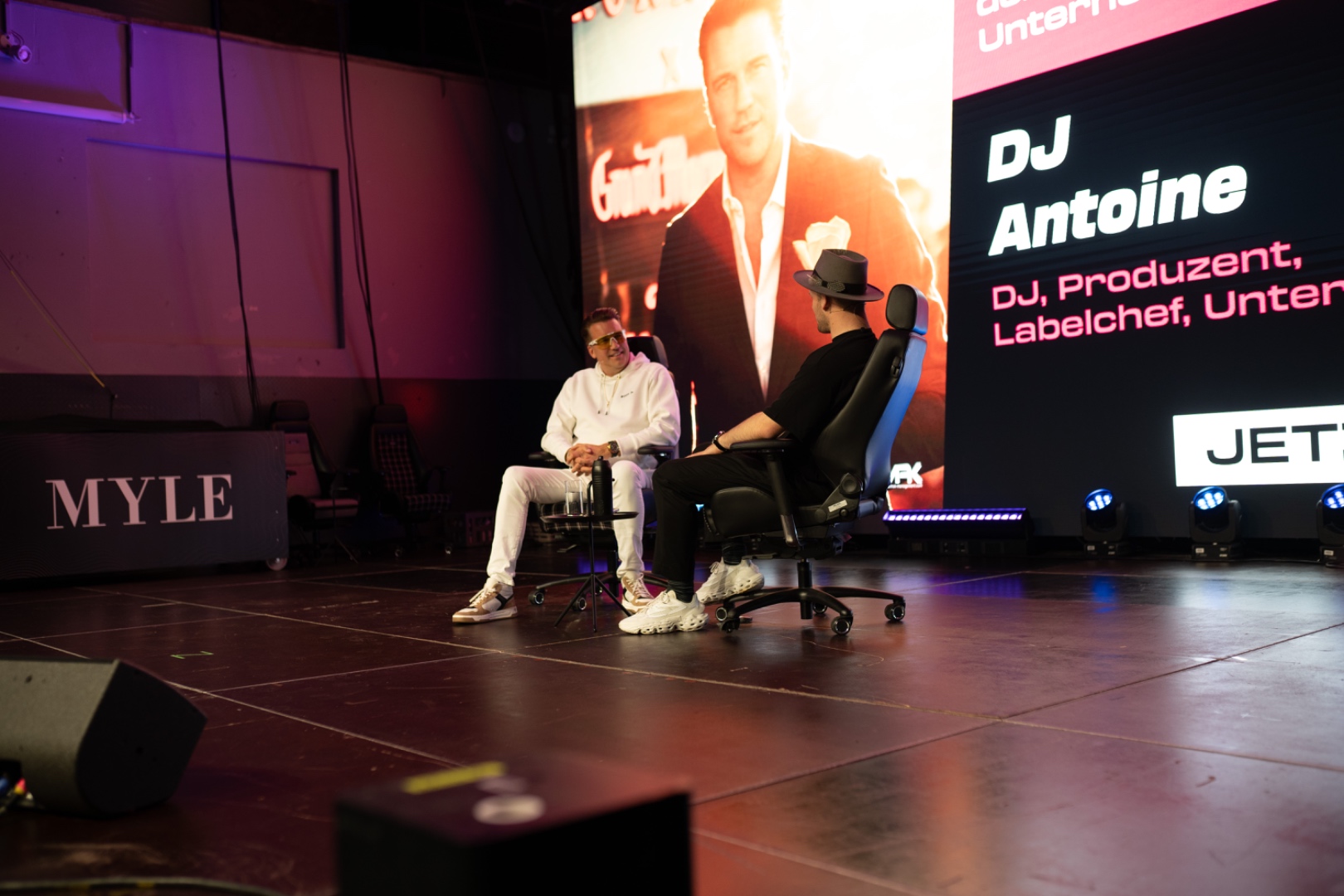 Hannes Krieger interviewing DJ Antoine on stage at MYLE Festival